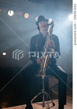 General plan of man with saxophone in his hand 106001682