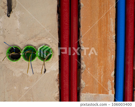 Plastic backbox for sockets or switches inserted into the drilled holes on wall 106003400