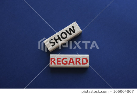 Show regard symbol. Wooden blocks with words Show regard. Beautiful deep blue background. Business and Show regard concept. Copy space. Show regard symbol. Wooden blocks with words Show regard. Beautiful deep blue background. Business and Show regard concept. Copy space. 106004807