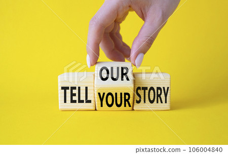 Tell Your or Our story symbol. Businessman hand turns wooden cubes and changes the words Tell Your story to Tell Our story. Beautiful yellow background. Business concept. Copy space Tell Your or Our story symbol. Businessman hand turns wooden cubes and changes the words Tell Your story to Tell Our story. Beautiful yellow background. Business concept. Copy space 106004840