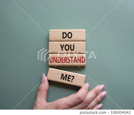 Do you understand me symbol. Concept words Do you understand me on wooden blocks. Beautiful grey green background. Businessman hand. Business and Do you understand me concept. Copy space. Do you understand me symbol. Concept words Do you understand me on wooden blocks. Beautiful grey green background. Businessman hand. Business and Do you understand me concept. Copy space. 106004842