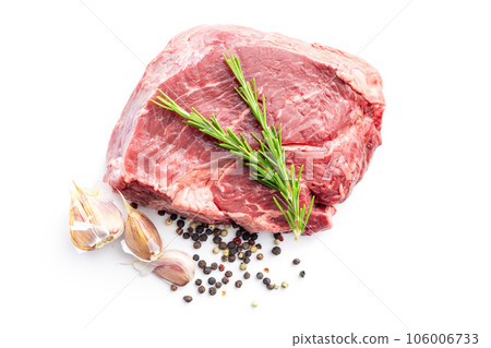Raw fillet steak beef meat, rosemary, garlic and pepper isolated on white background. 106006733
