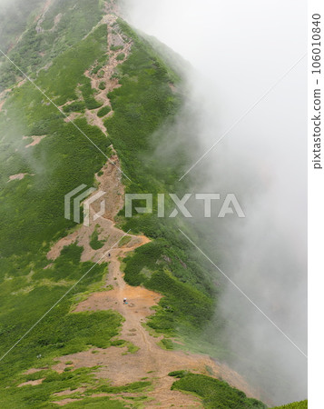Cloudy ridgeline mountain trail Cloudy ridgeline mountain trail 106010840