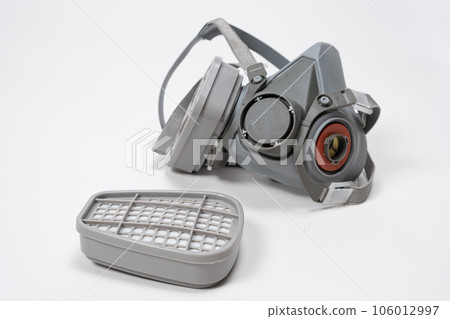 Respirator with dust and gas filters on a white background. Respirator with dust and gas filters on a white background. 106012997