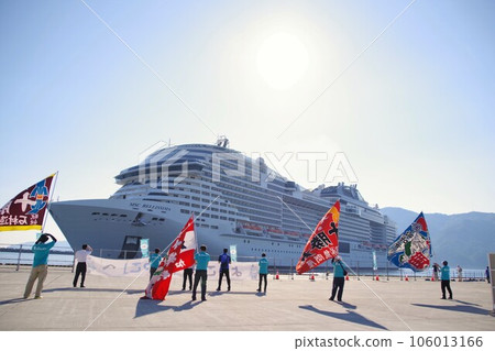 Locals welcome a large cruise ship with a big catch flag MSC Bellissima Locals welcome a large cruise ship with a big catch flag MSC Bellissima 106013166
