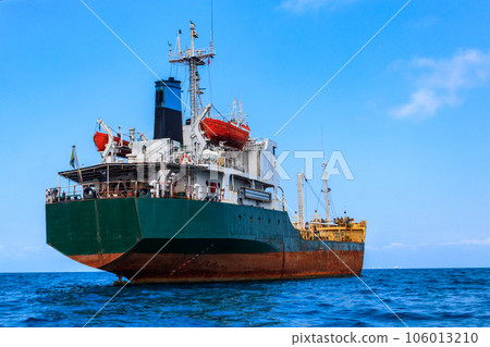 Large industrial ship sailing in the Indian ocean near Zanzibar, Tanzania Large industrial ship sailing in the Indian ocean near Zanzibar, Tanzania 106013210