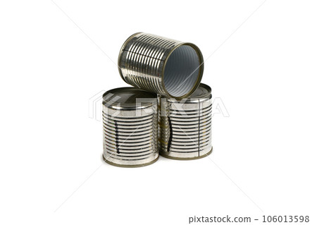 Open old metal tin cans isolated on white background. Open old metal tin cans isolated on white background. 106013598