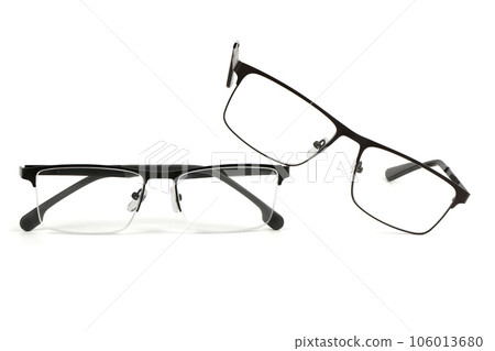 Pair of reading glasses isolated on white background. Pair of reading glasses isolated on white background. 106013680
