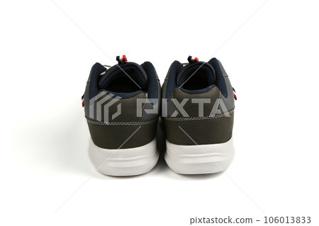 Pair of black fashionable stylish sports casual shoes isolated on white background Pair of black fashionable stylish sports casual shoes isolated on white background 106013833