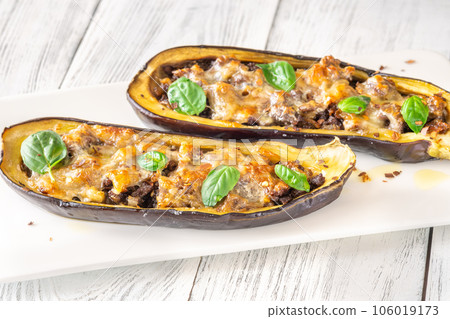 Sausage stuffed eggplant 106019173