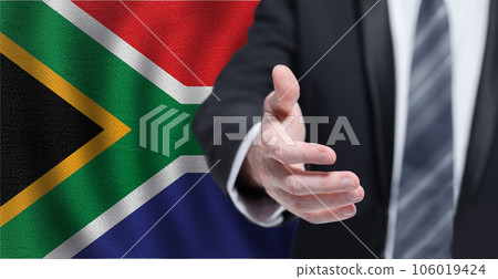 RSA business, politics, cooperation and travel concept. Hand on flag of South Africa background. 106019424