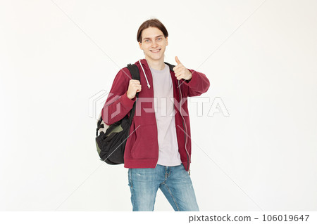 Young man student showing thumb up standing on white background 106019647