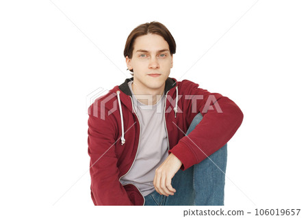 Young handsome man isolated on white studio wall background 106019657