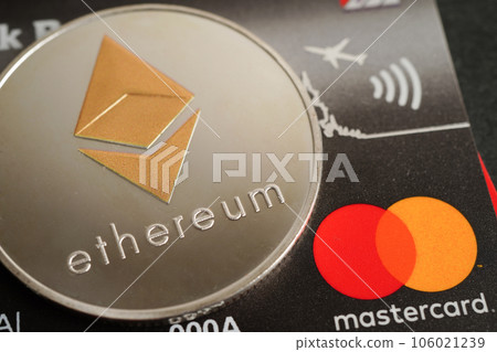 Bangkok, Thailand - December 15, 2021 Golden bitcoin with credit card on US dollar banknotes money for business and commercial, Digital currency, Virtual cryptocurrency. Bangkok, Thailand - December 15, 2021 Golden bitcoin with credit card on US dollar banknotes money for business and commercial, Digital currency, Virtual cryptocurrency. 106021239