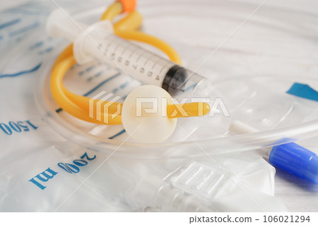 Foley catheter and urine drainage bag collect urine for disability or patient in hospital. 106021294