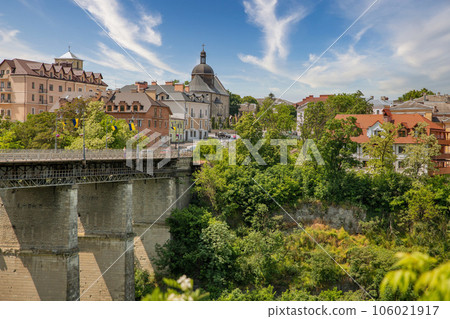 Kamianets-Podilskyi cityscape with Novoplanovsky bridge over the Smotrytsky canyon, Ukraine. Kamianets-Podilskyi cityscape with Novoplanovsky bridge over the Smotrytsky canyon, Ukraine. 106021917