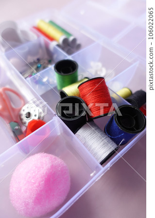 Tools and accessories for sewing on color background Tools and accessories for sewing on color background 106022065