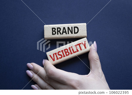 Brand visibility symbol. Wooden blocks with words Brand visibility. Beautiful deep blue background. Businessman hand. Business and Brand visibility concept. Copy space. Brand visibility symbol. Wooden blocks with words Brand visibility. Beautiful deep blue background. Businessman hand. Business and Brand visibility concept. Copy space. 106022395