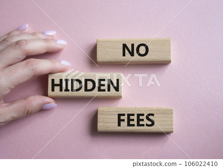 No Hidden Fees symbol. Concept words No Hidden Fees on wooden blocks. Businessman hand. Beautiful pink background. Business and No Hidden Fees concept. Copy space. No Hidden Fees symbol. Concept words No Hidden Fees on wooden blocks. Businessman hand. Beautiful pink background. Business and No Hidden Fees concept. Copy space. 106022410