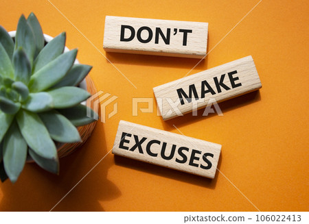 Dont make excuses symbol. Concept word Dont make excuses on wooden blocks. Beautiful orange background. Business and Dont make excuses concept. Copy space 106022413