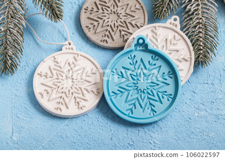 Concrete Christmas Decorations. Handmade craft gypsum objects for interior decoration. Artisan, small business, diy, hobby concept. 106022597