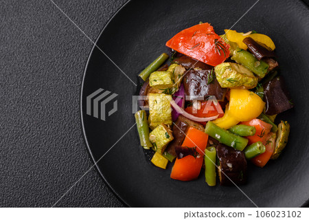 Delicious juicy fresh salad of baked eggplant, tomatoes, zucchini, onions Delicious juicy fresh salad of baked eggplant, tomatoes, zucchini, onions 106023102