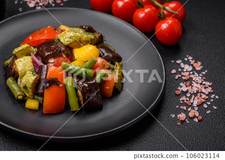 Delicious juicy fresh salad of baked eggplant, tomatoes, zucchini, onions 106023114