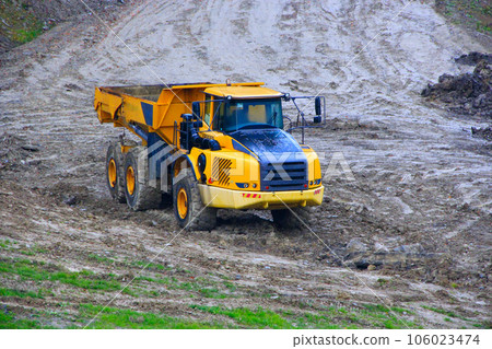 truck works on construction site 106023474
