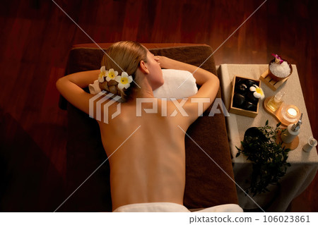 Top view woman customer enjoying relaxing anti-stress massage. Quiescent Top view woman customer enjoying relaxing anti-stress massage. Quiescent 106023861