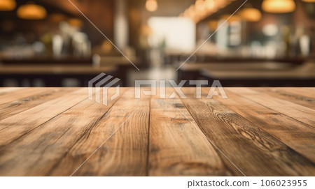 The empty wooden table top with blur background of cafe. Exuberant. 106023955
