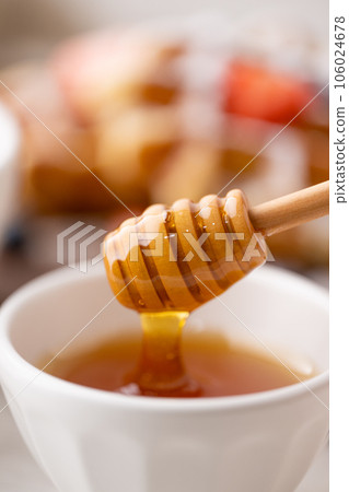 honey on honey stick with belgium waffle 106024678