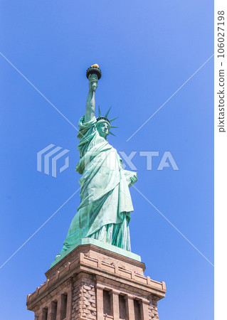 Close view of the Statue of Liberty over blue sky Close view of the Statue of Liberty over blue sky 106027198