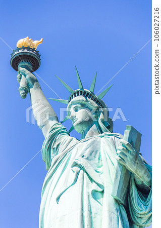 Close view of the Statue of Liberty over blue sky Close view of the Statue of Liberty over blue sky 106027216