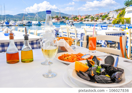 seafood dinner in a Greece resort near sea seafood dinner in a Greece resort near sea 106027836