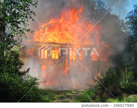 Burning house. Big wooden building completely destroyed by fire Burning house. Big wooden building completely destroyed by fire 106027980