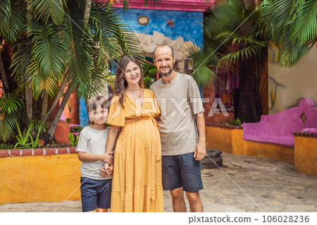 A loving couple in their 40s and their teenage son cherishing the miracle of childbirth in Mexico, embracing the journey of parenthood with joy and anticipation A loving couple in their 40s and their teenage son cherishing the miracle of childbirth in Mexico, embracing the journey of parenthood with joy and anticipation 106028236