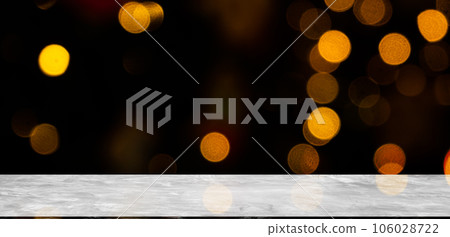 Blank Wooden Table with Orange Red Bokeh on Black Background,Golden Light Night Blur Circle Effect Sparkle,Card Poster,Empty Floor Counter for Presentation of Merry Christmas and Happy New Year 2023. 106028722