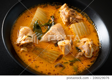 Chicken curry soup with roti Chicken curry soup with roti 106029076