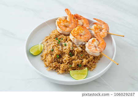 fried rice with shrimps skewers 106029287