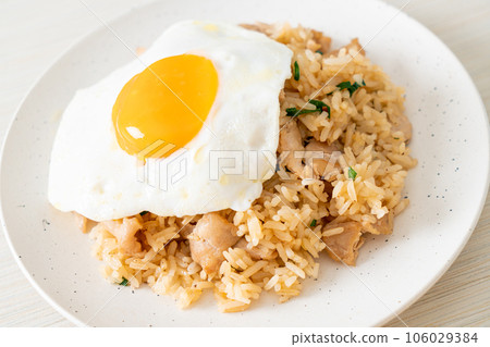 fried rice with pork and fried egg in Japanese style 106029384