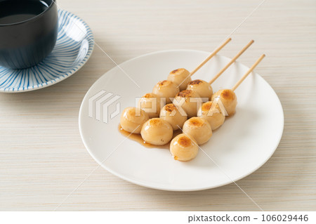 Mitarashi dango. Dumpling in a sweet soy sauce Mitarashi dango. Dumpling in a sweet soy sauce 106029446