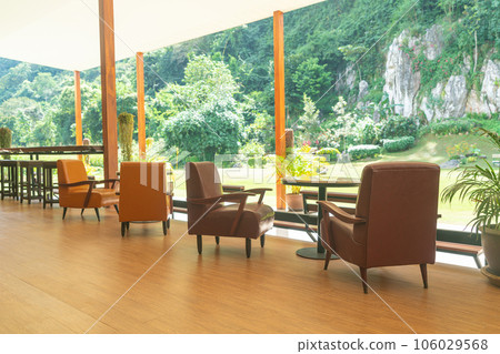 empty sofa chair with table on balcony 106029568