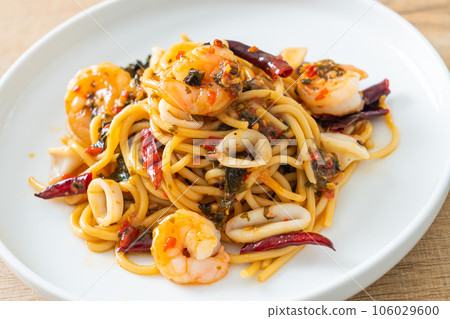 spicy spaghetti seafood on plate spicy spaghetti seafood on plate 106029600