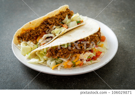 Mexican tacos with minced chicken 106029871