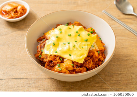 kimchi fried rice with pork and topped cheese kimchi fried rice with pork and topped cheese 106030060