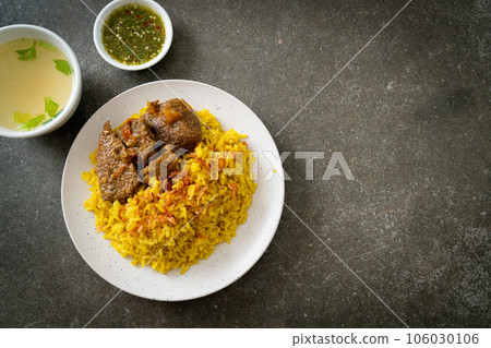 Beef Biryani or Curried rice and beef - Thai-Muslim version of Indian biryani, with fragrant yellow rice and beef Beef Biryani or Curried rice and beef - Thai-Muslim version of Indian biryani, with fragrant yellow rice and beef 106030106