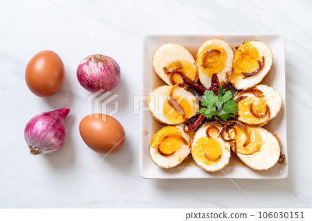 Fried Boiled Egg with Tamarind Sauce Fried Boiled Egg with Tamarind Sauce 106030151