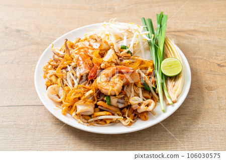 Pad Thai Seafood - Stir fried noodles with shrimps, squid or octopus and tofu Pad Thai Seafood - Stir fried noodles with shrimps, squid or octopus and tofu 106030575
