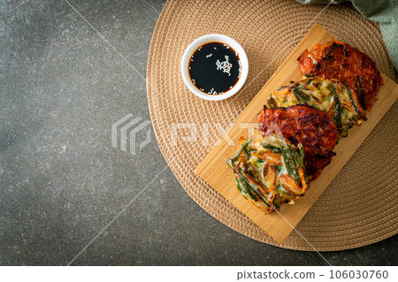 Pajeon or Korean pancake and Korean Kimchi pancake or Kimchijeon on white background 106030760