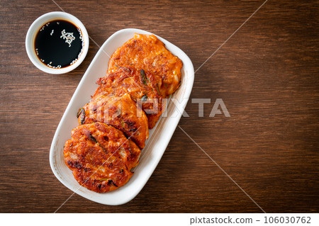Korean Kimchi pancake or Kimchijeon - Fried Mixed Egg, Kimchi, and Flour 106030762